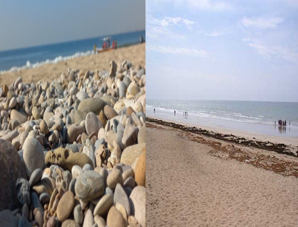 Pebble and sandy beach view with ocean waves and clear blue sky.